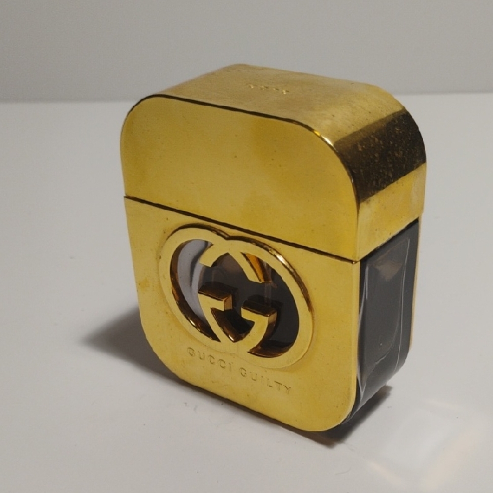 Gucci Guilty Gold and Black Perfume Bottle